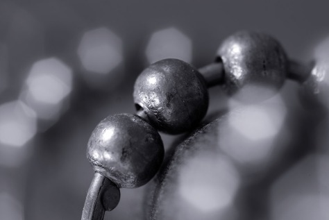 monochrome balls on wire with out of focus bokeh